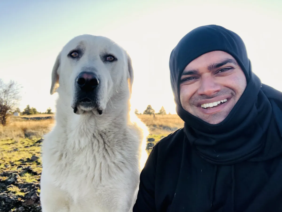 Himanshu Mehru, founder of Itemizable, with his dog Lincoln on his farm in Lincoln County, Washington